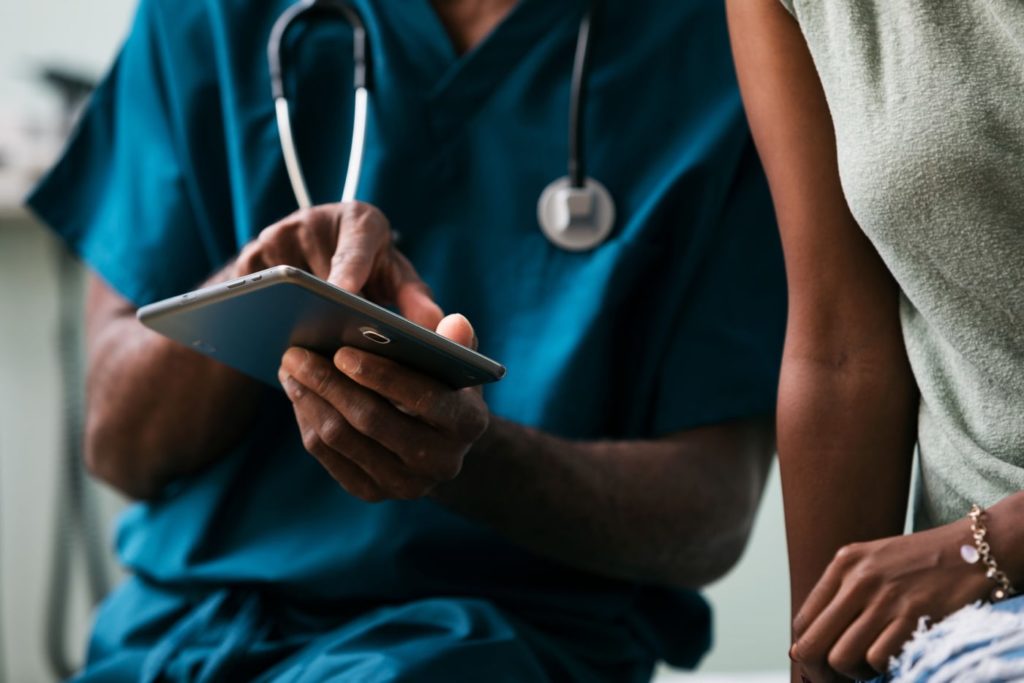 The clinician answering a patient's question about abortion pill